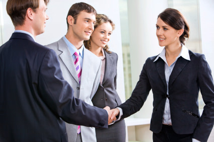 Business law partners shaking hands
